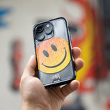 hover-image, Clear Transparent iPhone Case Ben Eine Orange Smiley MagSafe Wireless Charging